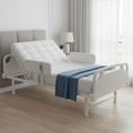 Adjustable electric hospital-style home bed with articulating head and foot sections and side rails
